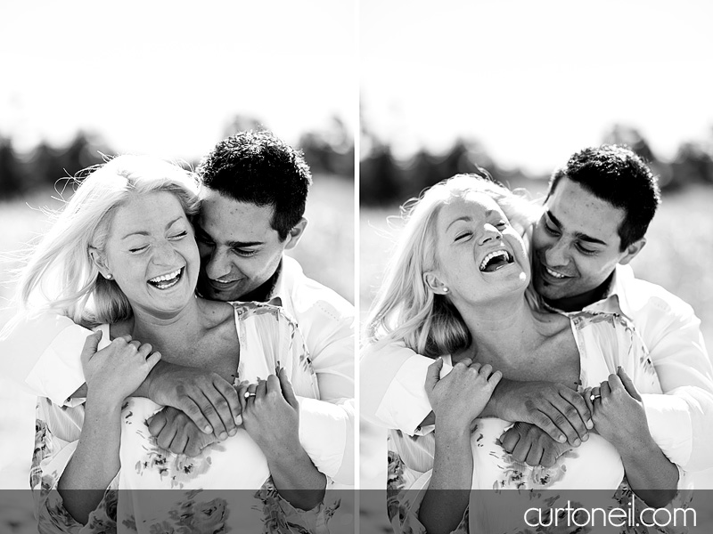 Sault Ste Marie Engagement Photography - Alyssa and Peter - beach, row boat, sand and sun