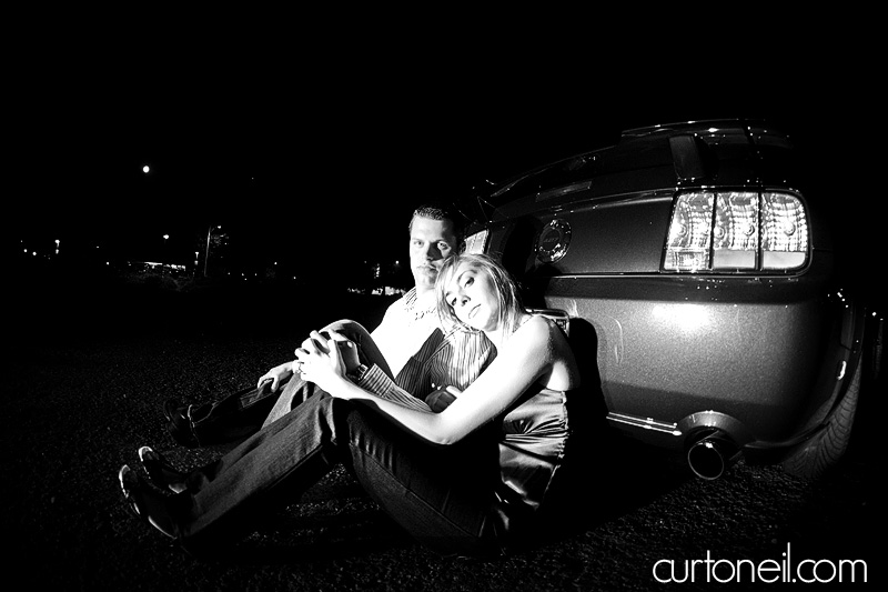 parking lot Roush Mustang sault engagement photography