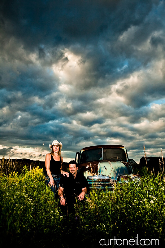 Sault Ste Marie Engagement Photography - Carol and Rob - Field with old Chevy truck, Pointe Des Chenes beach
