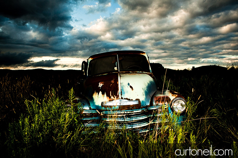 Sault Ste Marie Engagement Photography - Carol and Rob - Field with old Chevy truck, Pointe Des Chenes beach