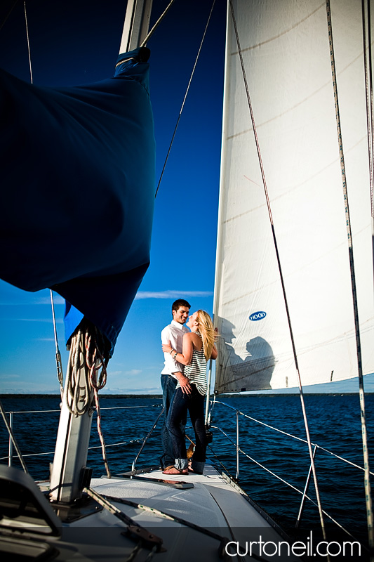 Sault Ste Marie Engagement Photography - Chelsea and Trevor - On a sailboat