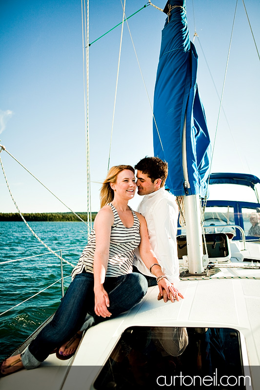 Sault Ste Marie Engagement Photography - Chelsea and Trevor - On a sailboat
