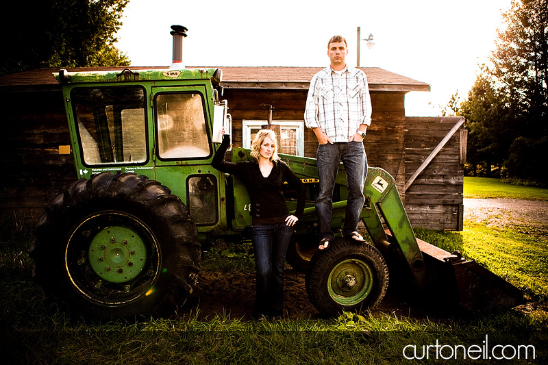 Sault Ste Marie Engagement Photography - Kristy and Graham - on the tractor