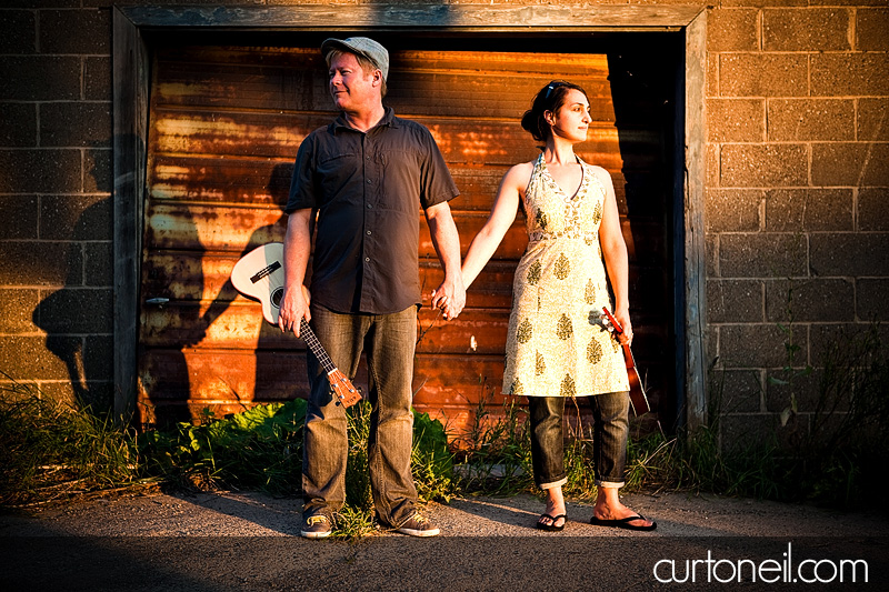Sault Ste Marie Engagement Photography - Mary and Steve with their ukuleles and the garage