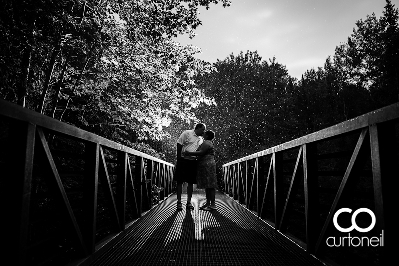 Sault Ste Marie Engagement Photography - Raymonde and Donny - Fort Creek bridge in the rain