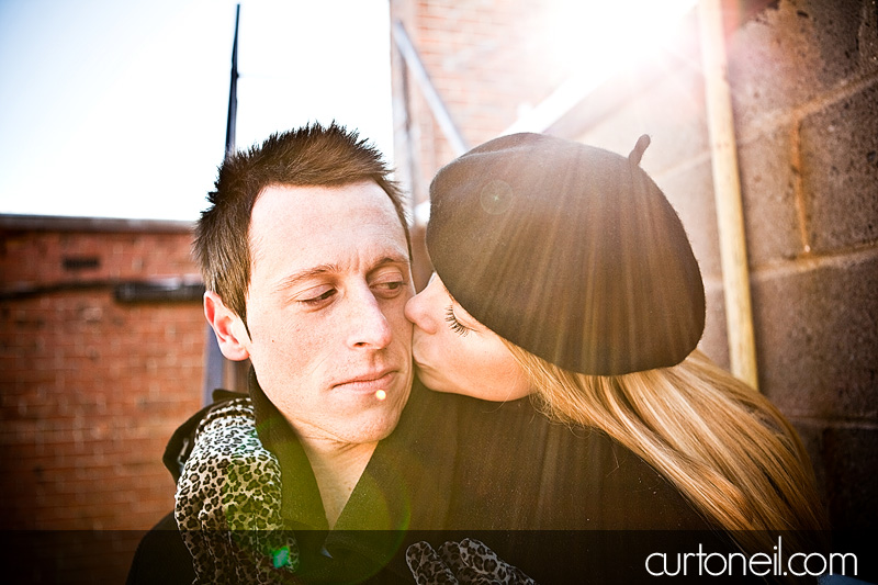 Engagement Shoot - Downtown - fire escape sunburst