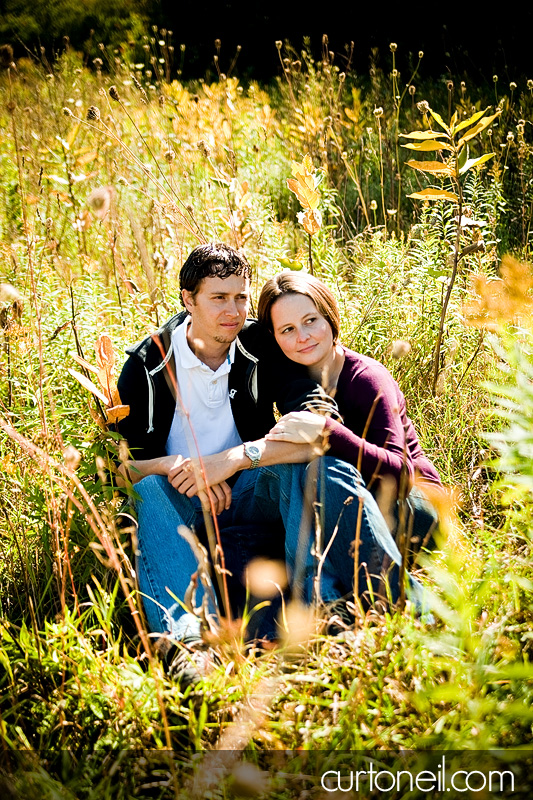Sault Engagement Photography - sitting in grass