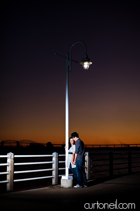 Sault Ste Marie Engagement Photogrpahy - Tania and Jason - Sneak peek on the boardwalk at sunset