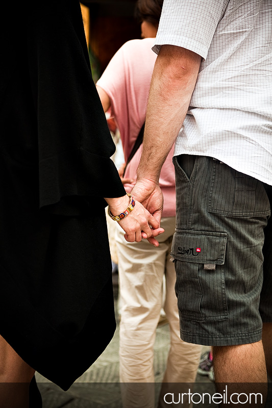 Tuscany Italy Engagement Photos - Michela and Aaron - holding hands in San Gimignano