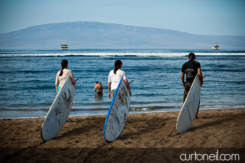 Surf lessons in Hawaii - Royal Hawaiian Surf Academy - heading out