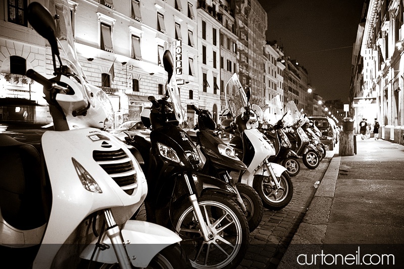 scooters on the street in Rome, Italy