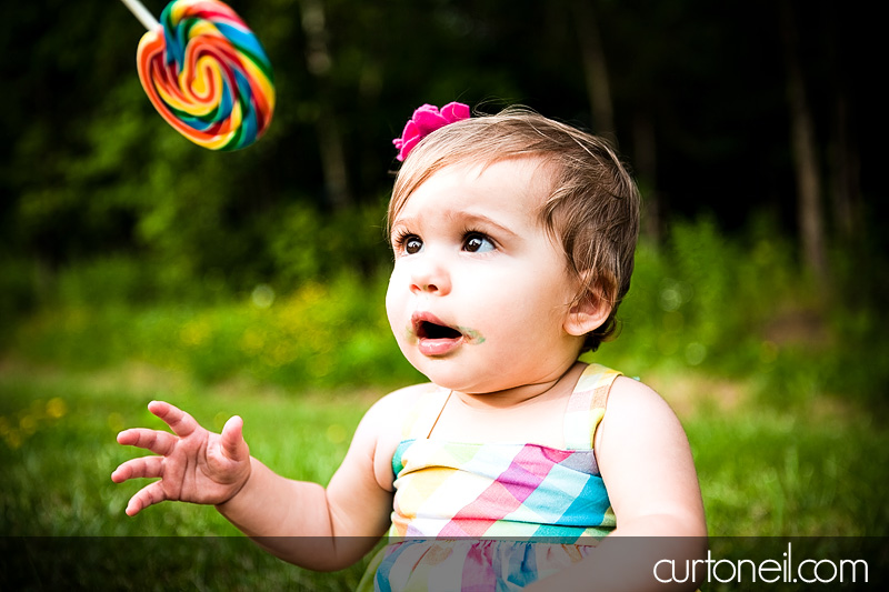 Macy at 9 months - baby photography - giant lollipop
