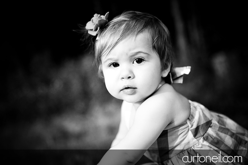Macy at 9 months - baby photography - on dad's back