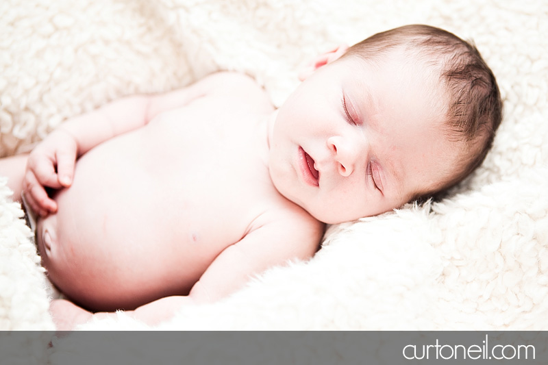 Sault Ste Marie Newborn Photography - Introducing Reese Penelope - newborn, football, baby