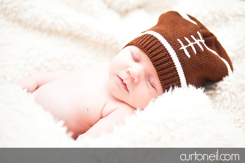 Sault Ste Marie Newborn Photography - Introducing Reese Penelope - newborn, football, baby