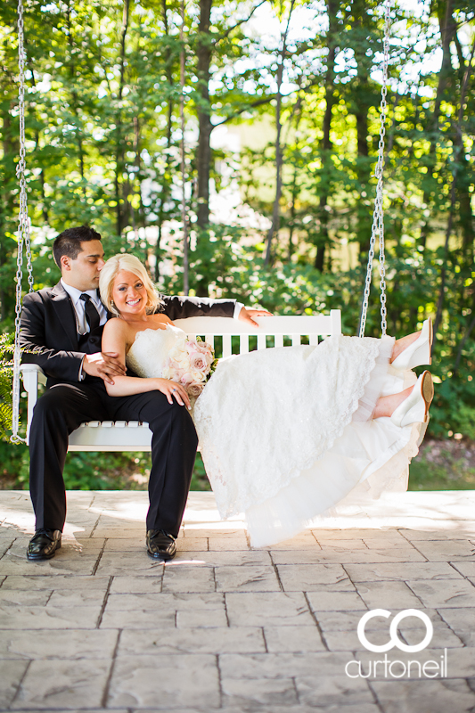 Sault Ste Marie Wedding Photography - Alyssa and Peter - sneak peek in Gros Cap on porch swing