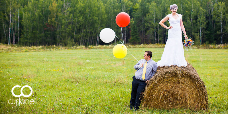 Sault Ste Marie Wedding Photography, Bruce Mines - Danielle and Brendan - sneak peek on a hay bale at Lawrence