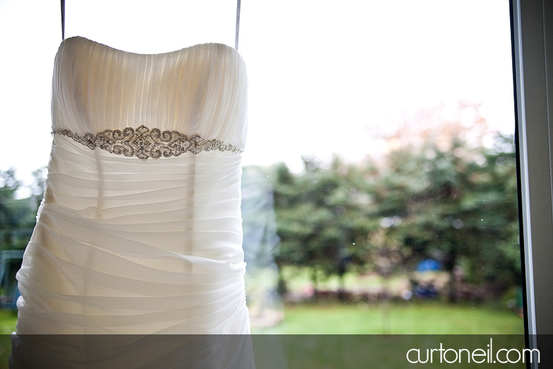 Sault Wedding - Dress on window