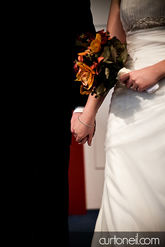 Sault Wedding - holding hands