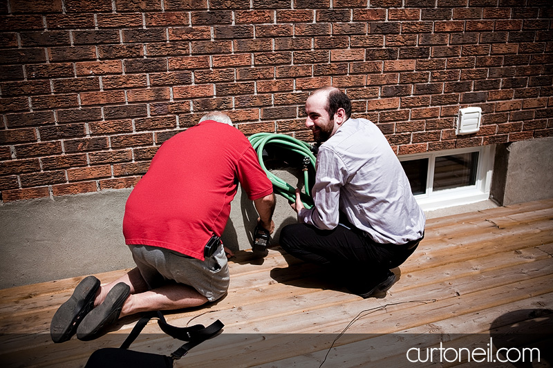 a little deck work - Curt O'Neil Lifestyle Wedding Photographer Sault Ste Marie
