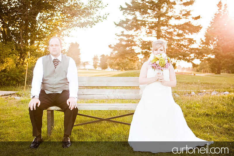 Sault Ste Marie Wedding - Katie and Paul - bench at number two tee