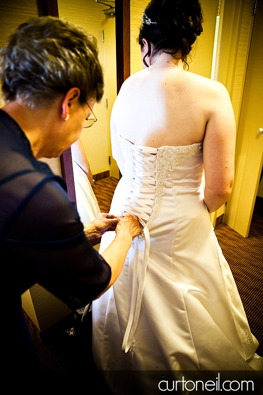 Sault Ste Marie Wedding - Mel and Tim - mom helping with dress