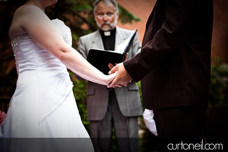 Sault Ste Marie Wedding - Mel and Tim - holding hands