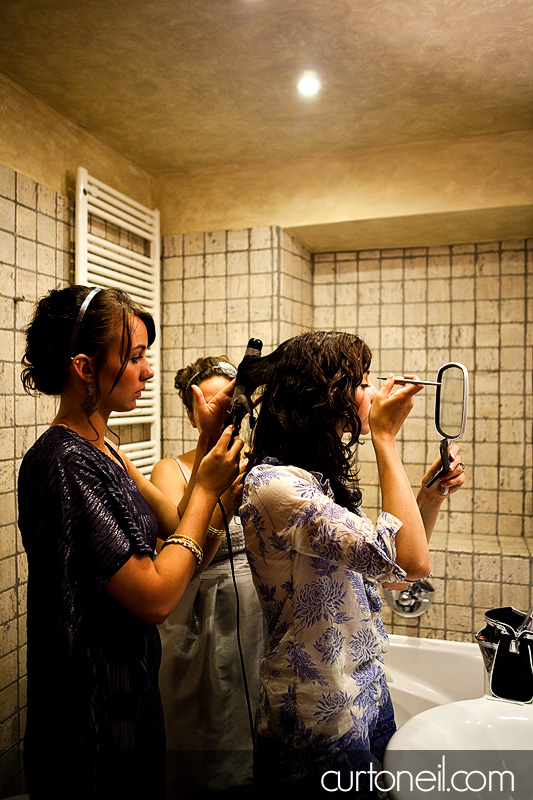 Michela getting ready with help at Borgo Iesolana - Bucine Tuscany Italy wedding