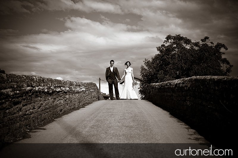 Michela and Aaron on the Roman bridge - Bucine Tuscany Italy wedding