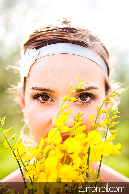 Kelsey behind her bouquet - Bucine Tuscany Italy wedding