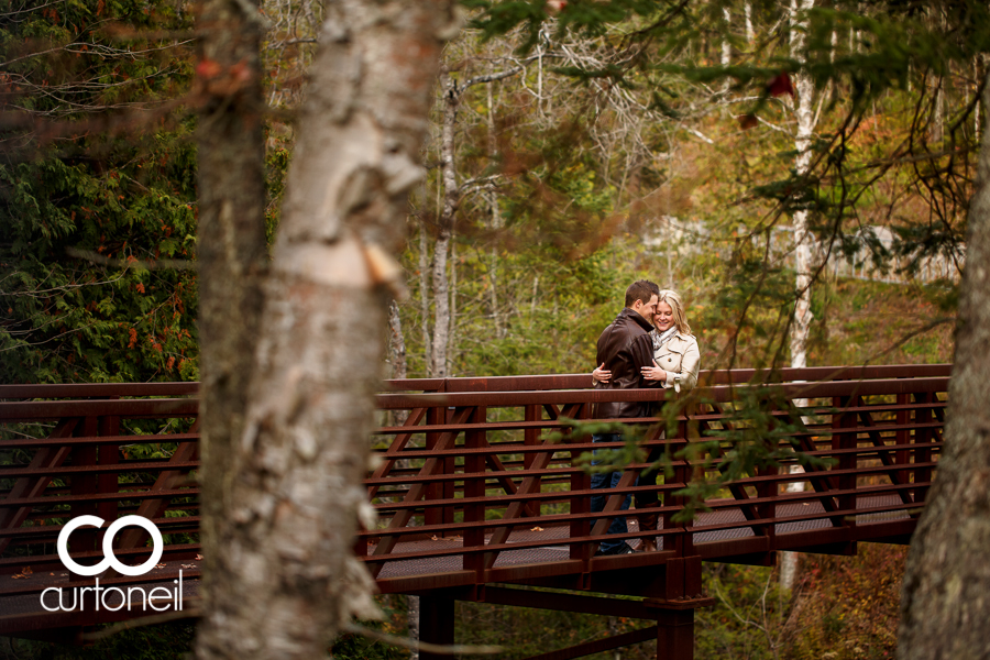 Sault Ste Marie Engagement Photography - Sarah and Marc - Fort Creek, sneak peek, fall, trees, bridge, cold