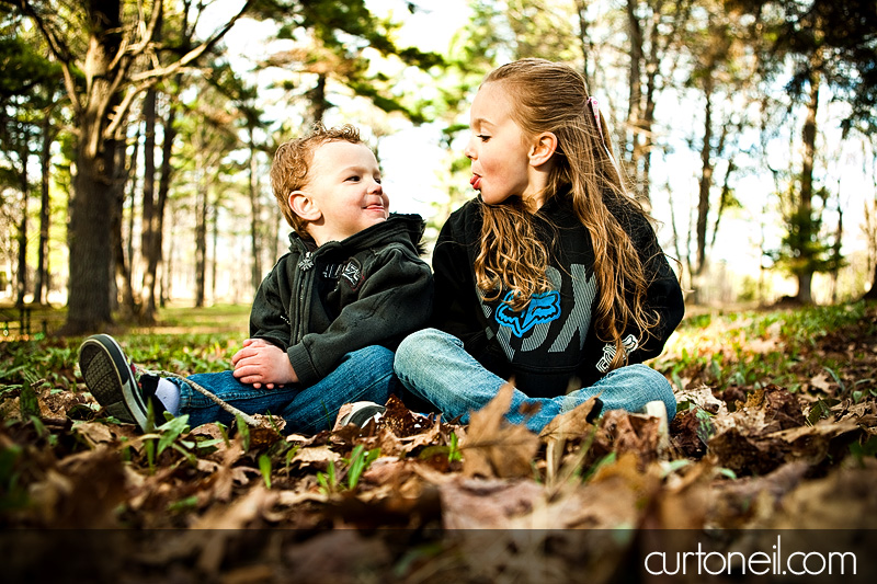 Kids Shoot - Camille and Chase sitting in the leaves