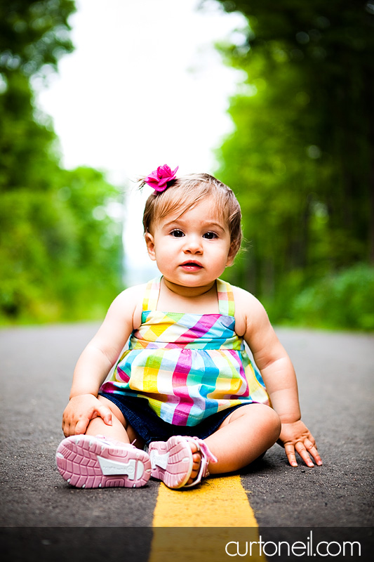 Macy at 9 months - baby photography - on the bike trail