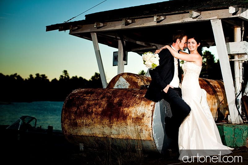 McGregor Bay Wedding Photography - Laura and Denny - Sneak peek on the dock by the old gas pumps