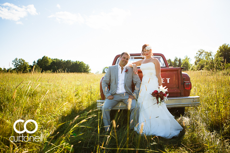St. Joseph Island Wedding Photography, Sault Ste Marie - Natasha and Jeff - old truck in a field on the island