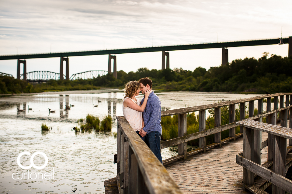 Katelin and Andrew - Engagement session on the boardwalk at Whitefish Island with the International Bridge in the background